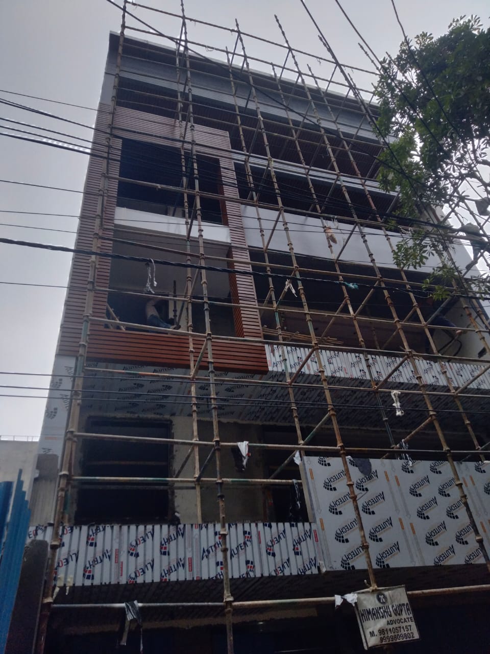 Façade work in progress at the Yudhishthir Gali Vishwas Nagar project