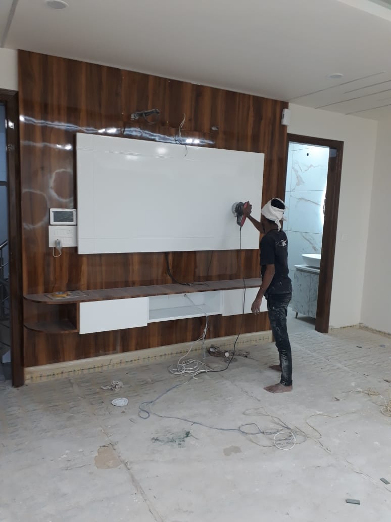 Custom TV wall and cabinetry finishing at 2/29 Yudhishthir Gali